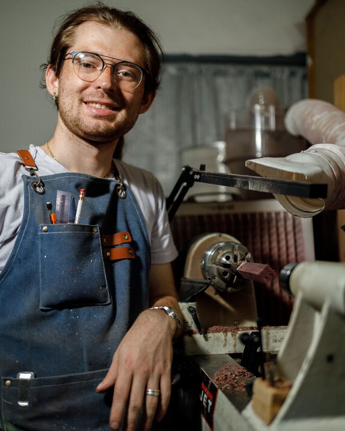 Placeholder workshop photography. The person shown is not an identified Prodella maker.